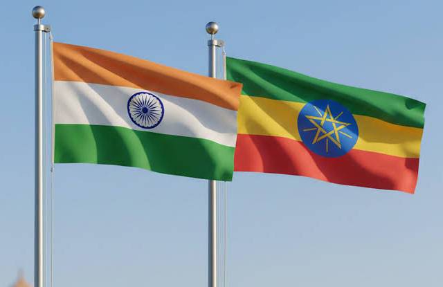Indian travellers exploring Addis Ababa, Ethiopia with the city skyline in the background